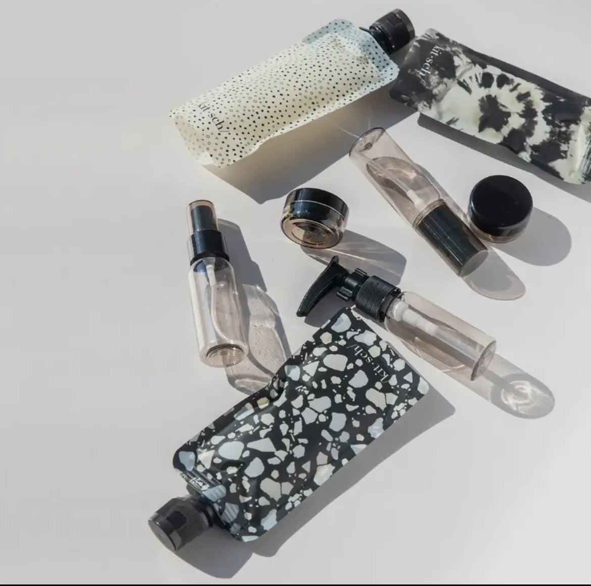 KITSCH | Refillable Ultimate Travel 11pc Set |
Black & Ivory